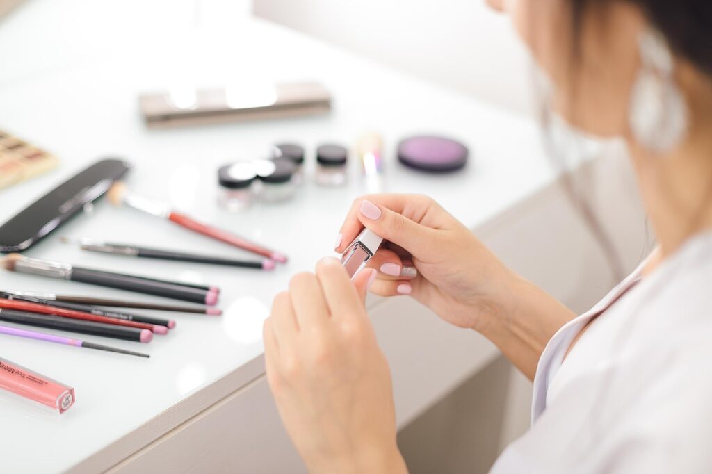 Woman putting makeup on