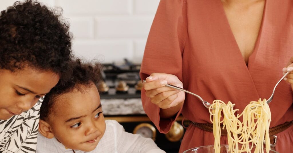 A mother prepares pasta with her children in a modern kitchen, creating a warm family moment indoors.